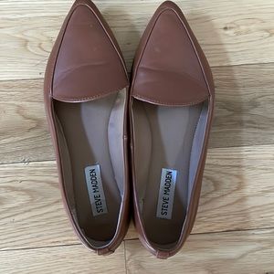 Brown leather flats